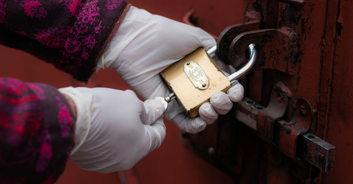 locksmith unlocking front door — Eco Clean Locksmith & Keys